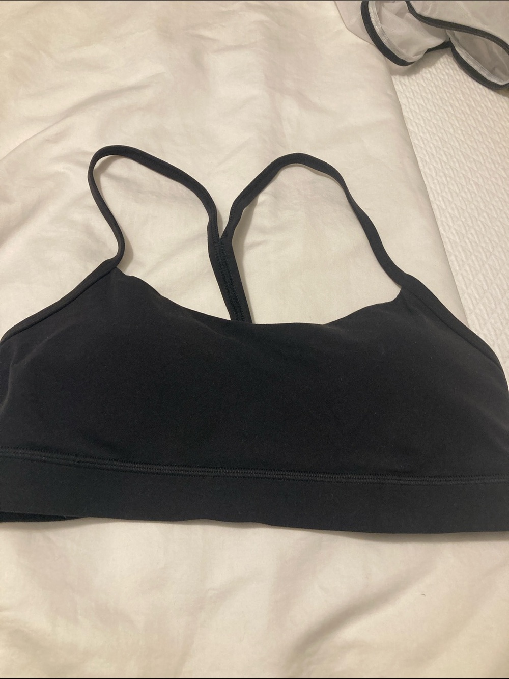 Lululemon classic black Racerback running bra in size 6 or four